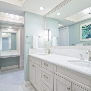 Beautiful remodeled master bathroom with double sink and vanity in the background (Picture on wall is mine)